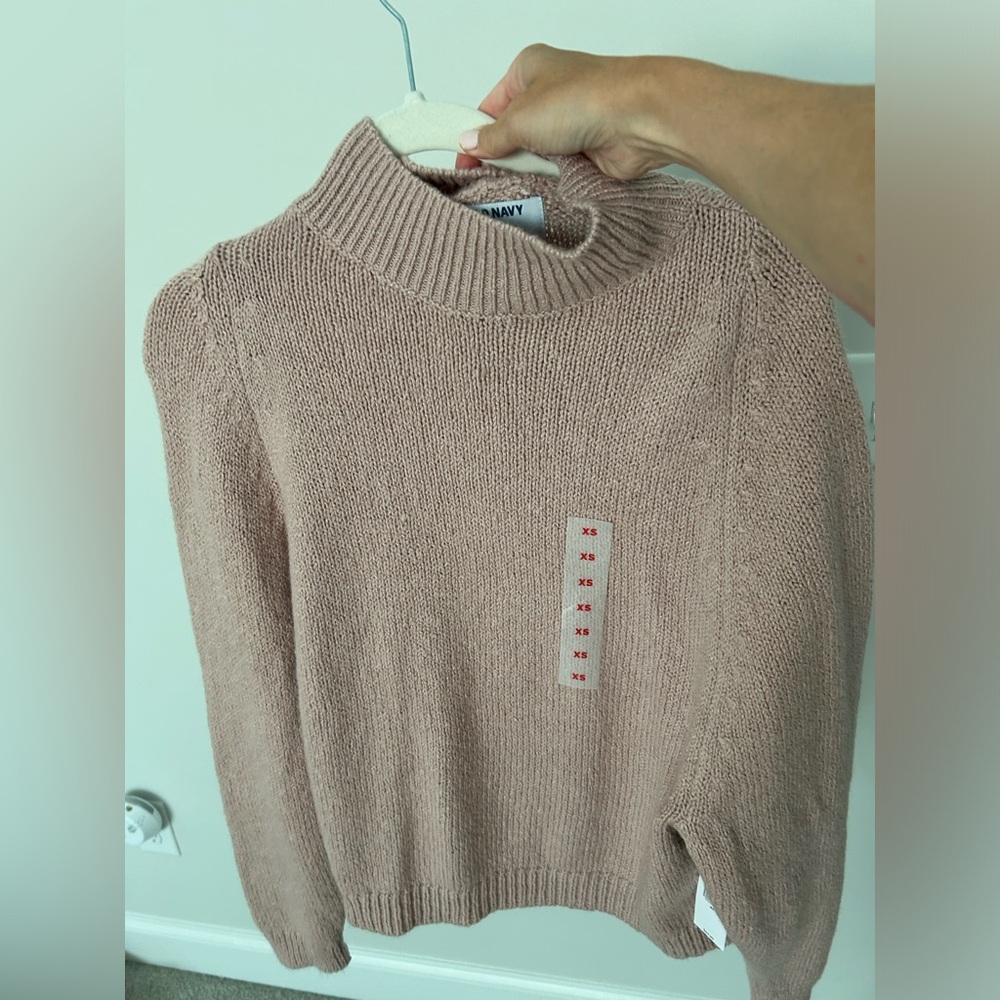 Pale pink turtle neck sweater